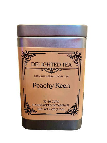 Delighted Tea Peachy Keen tea canister on a table with a neutral background